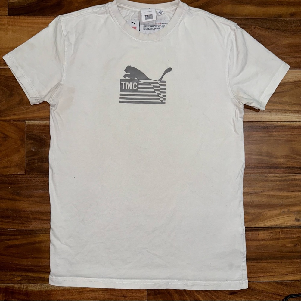 PUMA x TMC NIPSEY HUSSLE SHIRT
